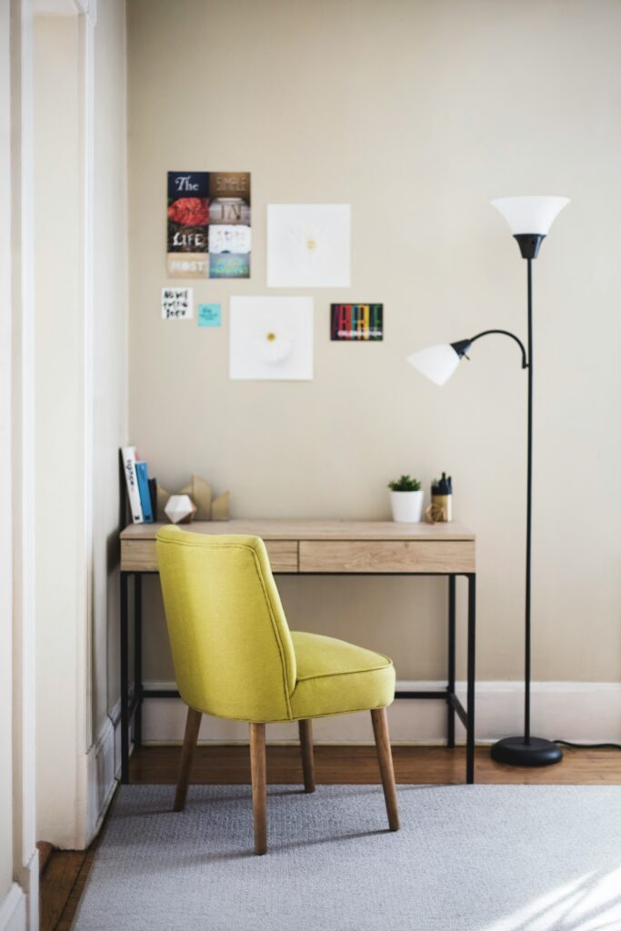 a chair next to a desk